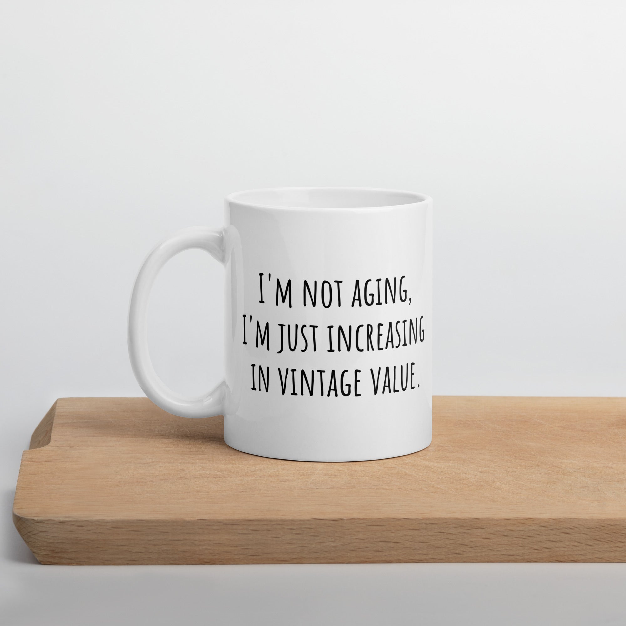 I'm not Aging I'm increasing in Vintage Value Ceramic White glossy mug for someone birthday