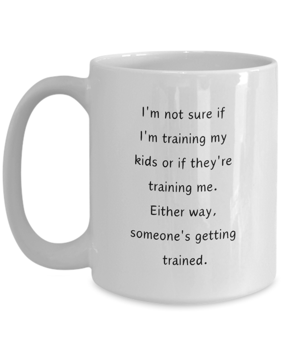 Funny Parent Mom Dad Ceramic White Mug Training Kids or Kids Training Us