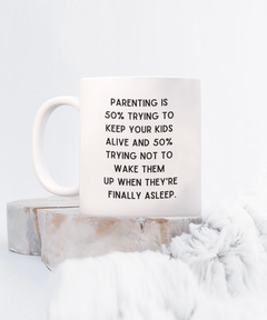 Parenting Keeping Kids Alive Funny Ceramic White Coffee Mug gift for Mother's Day Father's Day Mom or Dad