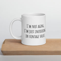 I'm not Aging I'm increasing in Vintage Value Ceramic White glossy mug for someone birthday