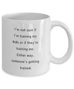 Funny Parent Mom Dad Ceramic White Mug Training Kids or Kids Training Us