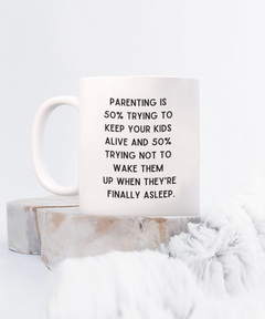 Parenting Keeping Kids Alive Funny Ceramic White Coffee Mug gift for Mother's Day Father's Day Mom or Dad