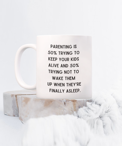 Parenting Keeping Kids Alive Funny Ceramic White Coffee Mug gift for Mother's Day Father's Day Mom or Dad